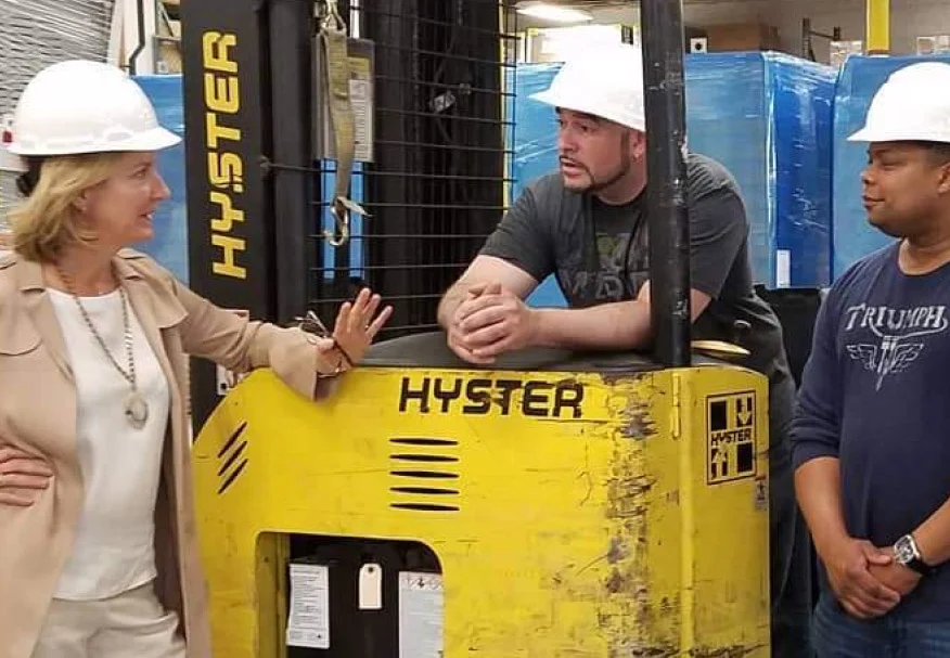 Jayne Millard with co-workers