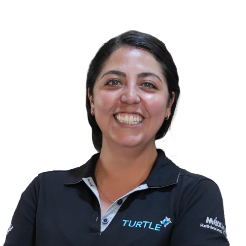 Turtle employee Yoselin smiling in a black Turtle polo shirt