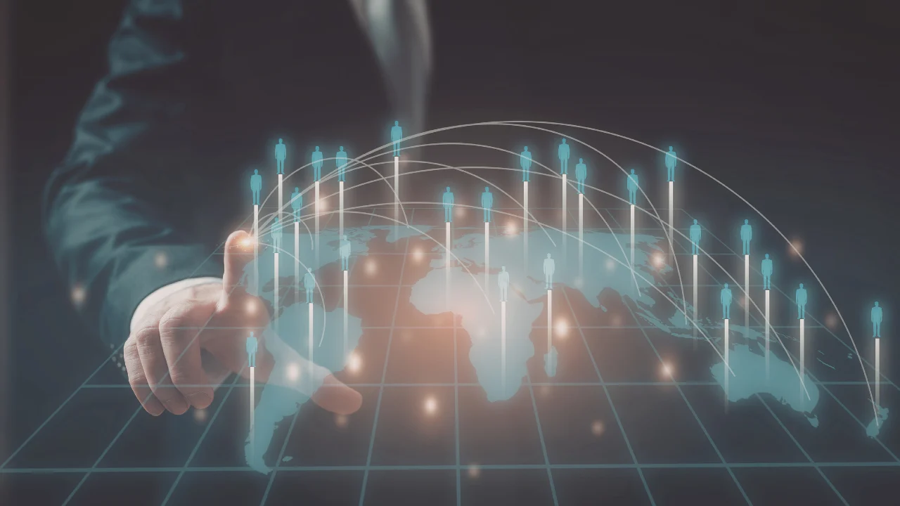 Business hand interacting with a digital world map showing connected global network users and data links.
